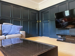 Lounge-room-sofa-windows-modern-blue-walls-filming-location-hire-lodge-London
