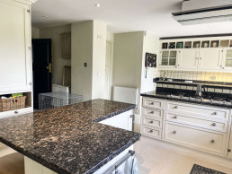 Kitchen-marble-island-white-tile-floor-cooker-worktops-garden-location-hire-lodge-London