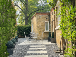 London film location North Lodge Hire for filming, TV, commercial, photoshoots, Luxury property London homes London real estate patio front garden.